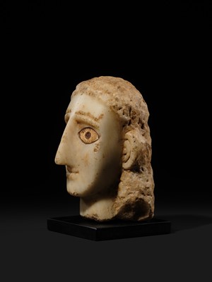 Lot 61 - A RARE ALABASTER HEAD OF A WOMAN, ANCIENT KINGDOM OF SABA