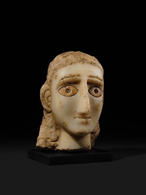 Lot 61 - A RARE ALABASTER HEAD OF A WOMAN, ANCIENT KINGDOM OF SABA