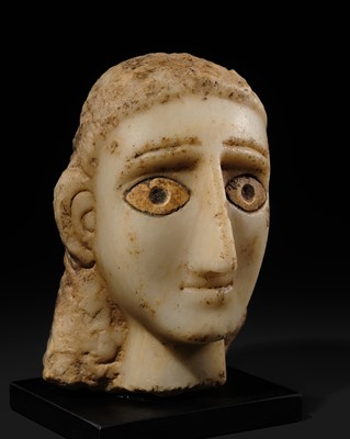 Lot 61 - A RARE ALABASTER HEAD OF A WOMAN, ANCIENT KINGDOM OF SABA