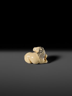 Lot 111 - JOEI: A SUPERB MARINE IVORY NETSUKE OF A RECLINING HORSE