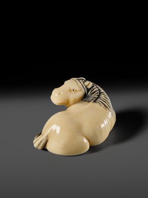 Lot 111 - JOEI: A SUPERB MARINE IVORY NETSUKE OF A RECLINING HORSE