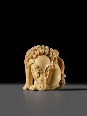 Lot 101 - A FINE IVORY NETSUKE OF A SEATED BAKU