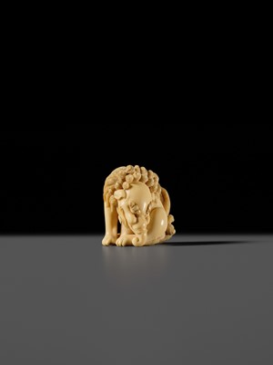 Lot 101 - A FINE IVORY NETSUKE OF A SEATED BAKU