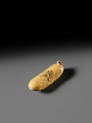 Lot 146 - MASAYOSHI: A FINE OSAKA SCHOOL IVORY NETSUKE OF A CUCUMBER AND DRAGONFLY