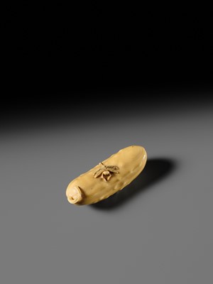 Lot 146 - MASAYOSHI: A FINE OSAKA SCHOOL IVORY NETSUKE OF A CUCUMBER AND DRAGONFLY