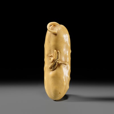 Lot 146 - MASAYOSHI: A FINE OSAKA SCHOOL IVORY NETSUKE OF A CUCUMBER AND DRAGONFLY