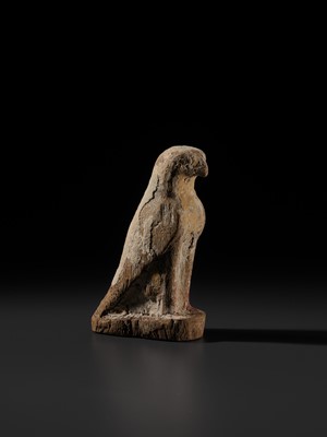 Lot 18 - A PAINTED WOOD FIGURE OF A FALCON, THE EMBODIMENT OF HORUS, LATE PERIOD TO PTOLEMAIC ERA