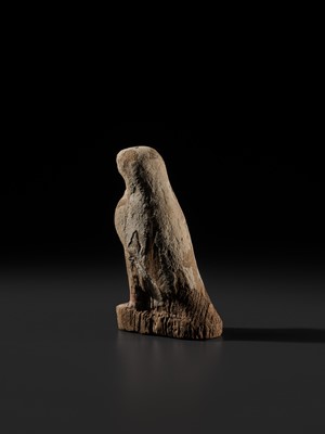 Lot 18 - A PAINTED WOOD FIGURE OF A FALCON, THE EMBODIMENT OF HORUS, LATE PERIOD TO PTOLEMAIC ERA