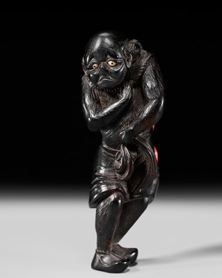 Lot 275 - MIGETSU: AN EBONY WOOD AND NEGORO LACQUER NETSUKE OF A SOUTH SEA CORAL DIVER