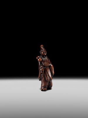 Lot 130 - A FINE WOOD NETSUKE OF A KEMARI PLAYER