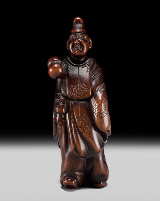 Lot 130 - A FINE WOOD NETSUKE OF A KEMARI PLAYER