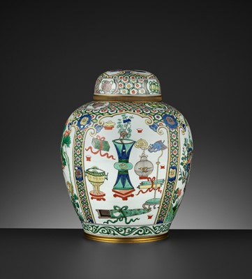 Lot 303 - A FAMILLE VERTE ‘BUDDHIST TREASURES’ JAR AND COVER, QING DYNASTY