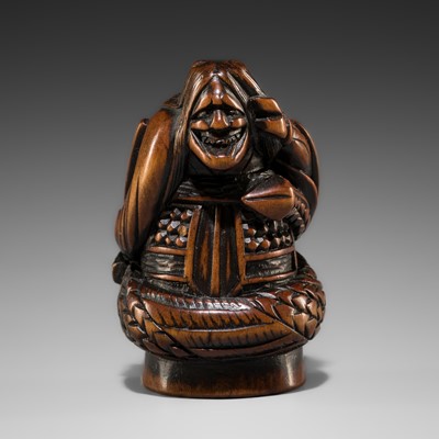 A FINE WOOD NETSUKE OF KIYOHIME