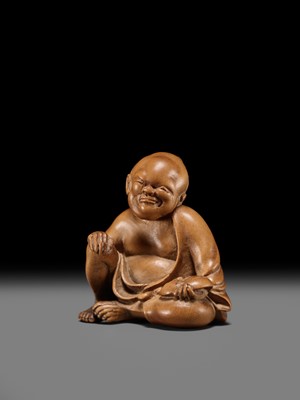 Lot 156 - A SUPERB INLAID WOOD NETSUKE OF A MAN WITH AN OKAME MASK, SCHOOL OF KOKEISAI SANSHO