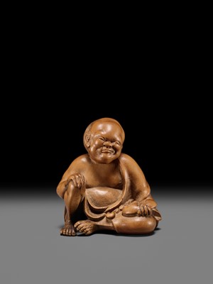 Lot 156 - A SUPERB INLAID WOOD NETSUKE OF A MAN WITH AN OKAME MASK, SCHOOL OF KOKEISAI SANSHO