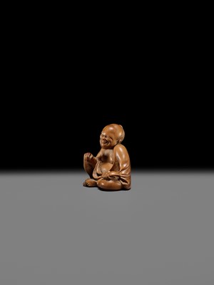 Lot 156 - A SUPERB INLAID WOOD NETSUKE OF A MAN WITH AN OKAME MASK, SCHOOL OF KOKEISAI SANSHO