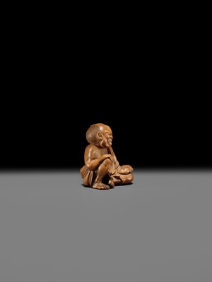 Lot 156 - A SUPERB INLAID WOOD NETSUKE OF A MAN WITH AN OKAME MASK, SCHOOL OF KOKEISAI SANSHO