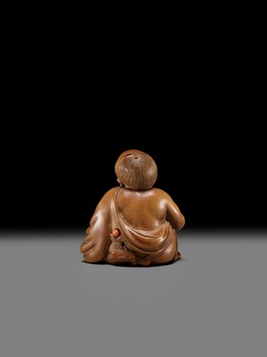 Lot 156 - A SUPERB INLAID WOOD NETSUKE OF A MAN WITH AN OKAME MASK, SCHOOL OF KOKEISAI SANSHO