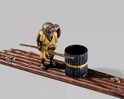 Lot 40 - SHOZUI: A FINE HAMANO SCHOOL MIXED-METAL BUNCHIN (PAPERWEIGHT) OF A FISHERMAN ON A FLOAT