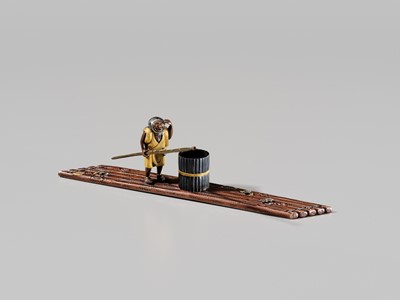 Lot 40 - SHOZUI: A FINE HAMANO SCHOOL MIXED-METAL BUNCHIN (PAPERWEIGHT) OF A FISHERMAN ON A FLOAT