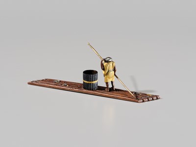 Lot 40 - SHOZUI: A FINE HAMANO SCHOOL MIXED-METAL BUNCHIN (PAPERWEIGHT) OF A FISHERMAN ON A FLOAT