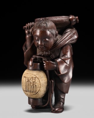 Lot 279 - SUZUKI TOKOKU: A SUPERB INLAID WOOD NETSUKE OF A BOY WITH A LANTERN AND PARASOL
