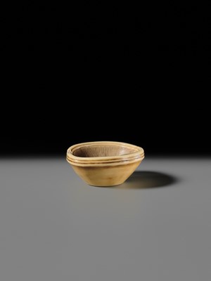 OHARA MITSUHIRO: A SUPERB IVORY NETSUKE OF A SEA BREAM HEAD IN A SURIBACHI (MORTAR), DATED 1855