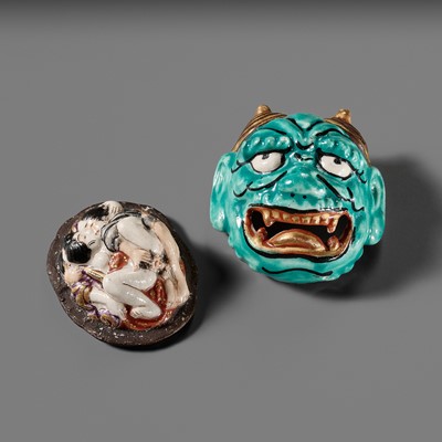 AN UNUSUAL CERAMIC SHUNGA ‘ONI MASK’ NETSUKE