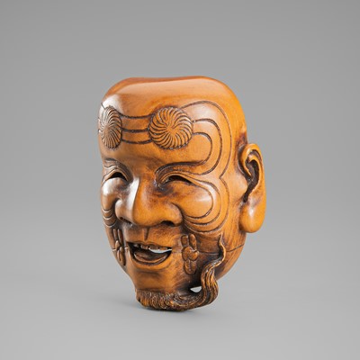 Lot 655 - A LARGE WOOD MASK NETSUKE OF OKINA (HAKUSHIKIJO)