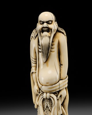 Lot 83 - A TALL IVORY NETSUKE OF A SENNIN, ATTRIBUTED TO MIURA YOSHINAGA