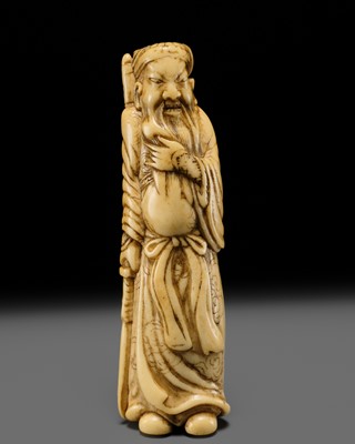 Lot 313 - A FINE ANTLER NETSUKE OF KAN’U
