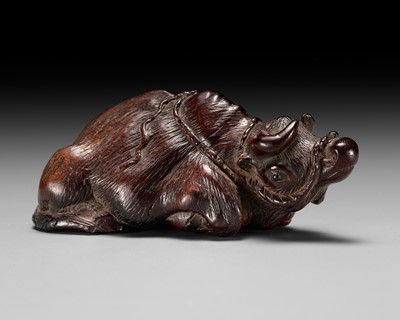 Lot 460 - MORIKO: A LARGE AND RARE WOOD NETSUKE OF A RECUMBENT OX