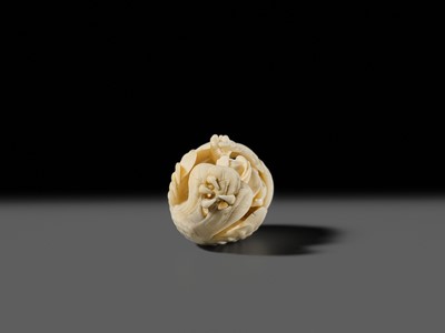 Lot 151 - IKKU: A MASTERFUL IVORY NETSUKE OF AN EAGLE