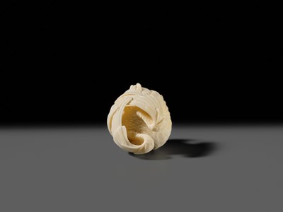 Lot 151 - IKKU: A MASTERFUL IVORY NETSUKE OF AN EAGLE