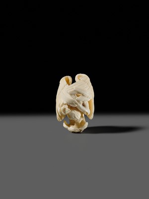 Lot 151 - IKKU: A MASTERFUL IVORY NETSUKE OF AN EAGLE