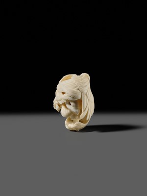 Lot 151 - IKKU: A MASTERFUL IVORY NETSUKE OF AN EAGLE
