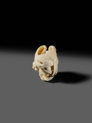 Lot 151 - IKKU: A MASTERFUL IVORY NETSUKE OF AN EAGLE