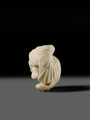 Lot 151 - IKKU: A MASTERFUL IVORY NETSUKE OF AN EAGLE