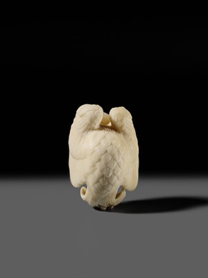 Lot 151 - IKKU: A MASTERFUL IVORY NETSUKE OF AN EAGLE