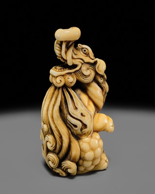 Lot 102 - A SUPERB IVORY NETSUKE OF A BAKU