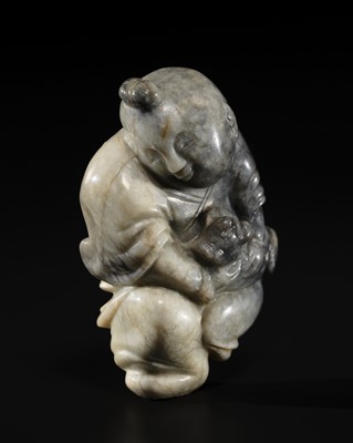 Lot 175 - A SUPERB WHITE AND GREY JADE CARVING OF A BOY AND DOG, QING DYNASTY