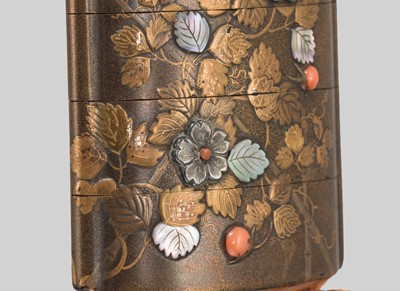 Lot 41 - A FOUR-CASE SHIBAYAMA-STYLE LACQUER INRO WITH BLOSSOMS AND BERRIES