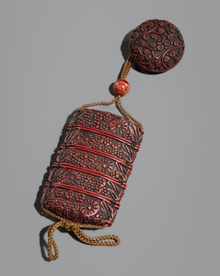 Lot 143 - A FOUR-CASE TSUISHU LACQUER INRO DEPICTING CHRYSANTHEMUM