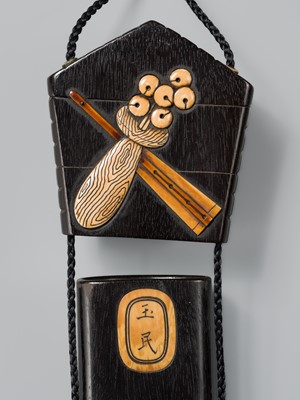 Lot 63 - GYOKUMIN: A MECHANICAL WOOD SAGEMONO SET