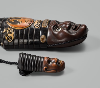 Lot 63 - GYOKUMIN: A MECHANICAL WOOD SAGEMONO SET