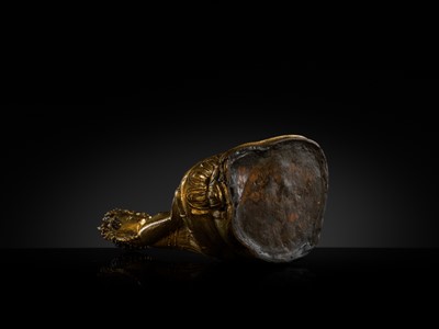 A TURQUOISE-INLAID GILT COPPER-ALLOY FIGURE OF THE CROWNED BUDDHA, TIBET, CIRCA 15TH-16TH CENTURY