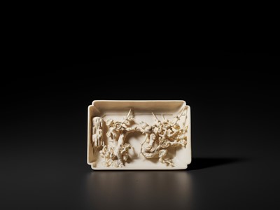 Lot 576 - A CARVED IVORY BASE WITH A HIDDEN ‘BIRDS AND PRUNUS’ SCENE, QING