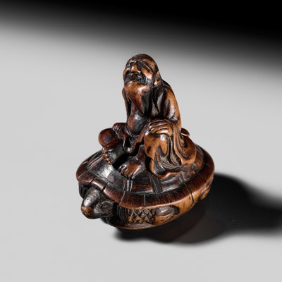 Lot 123 - A SMALL AND FINE WOOD NETSUKE OF URASHIMA TARO