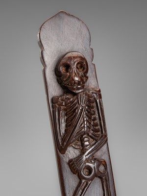 A LARGE CONTEMPORARY WOOD NETSUKE OF A GRAVE POST (SOTOBA) AND SKELETON