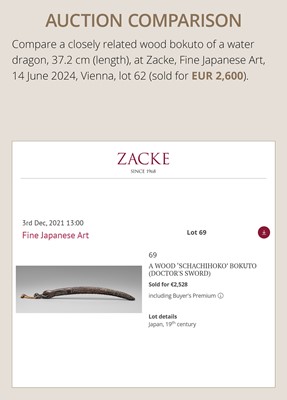 Lot 49 - AN INSCRIBED WOOD BOKUTO (DOCTOR’S SWORD) OF A SHACHIHOKO (DRAGONFISH)